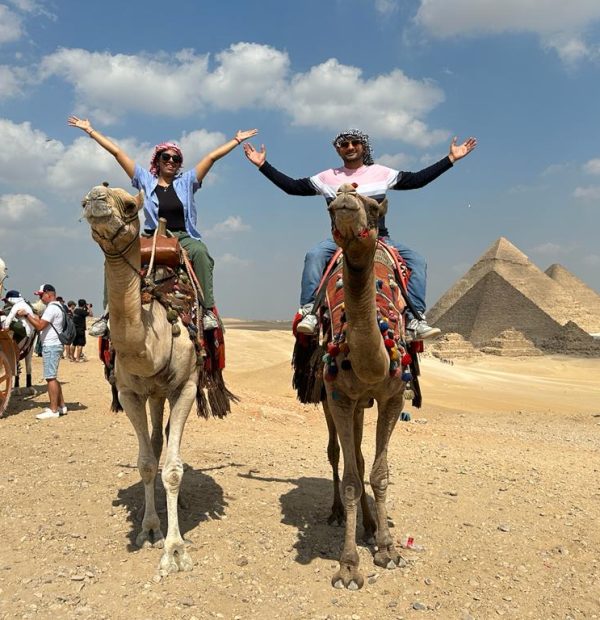 Half Day Pyramids of Giza Sphinx and Shopping tour & Papyrus Museum & Bedouin family house Essential oils & Cotton Shop and Local Bazaar