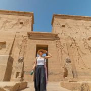 Kayaking on the Nile near Philae Temple in Aswan with ancient Egyptian monuments and islands