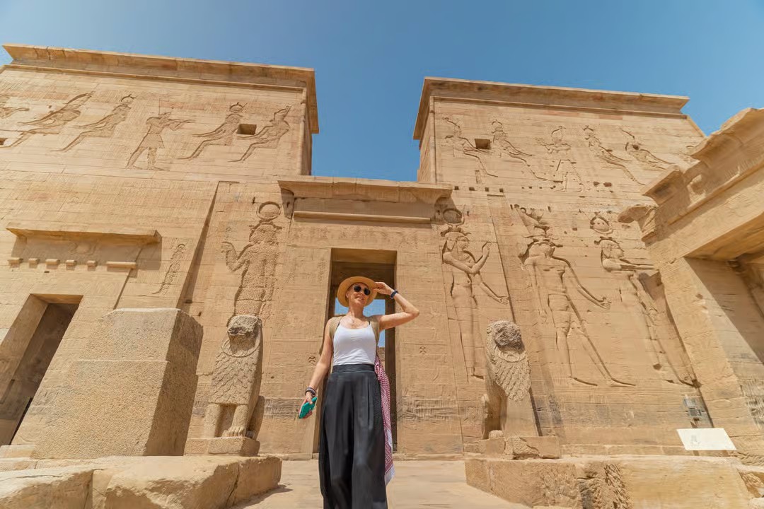 Kayaking on the Nile near Philae Temple in Aswan with ancient Egyptian monuments and islands